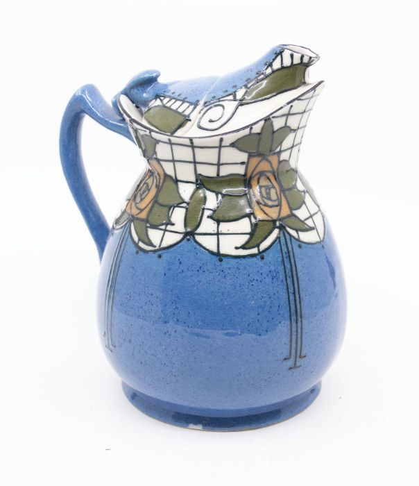 A Charlotte Rhead for Woods and Sons "Cosy" Teapot in stylised Rose design. Height approx 18cm. No