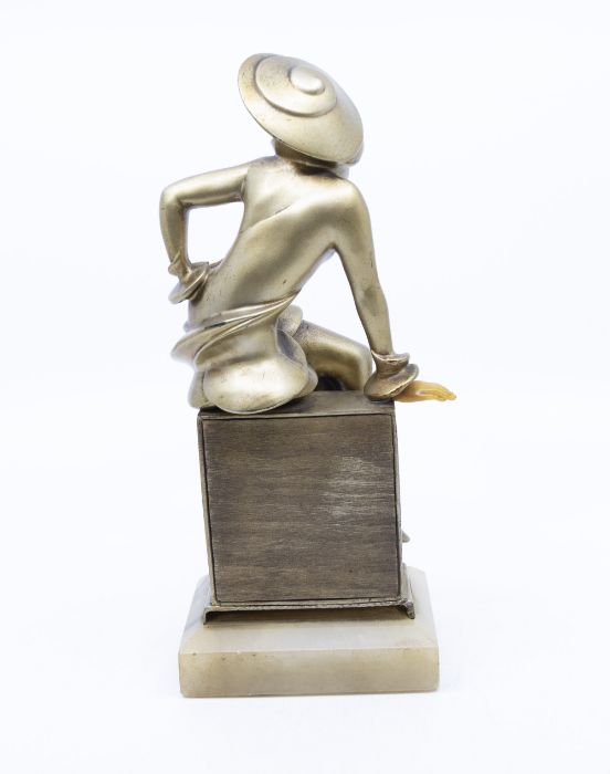 1930’s Spelter figure of a seated lady on onyx base. Height approx 25cm. Slight paint loss to the - Image 2 of 2