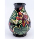 Moorcroft Pottery small baluster vase in 'Palmata' pattern. Height approx 14cm. No signs of damage