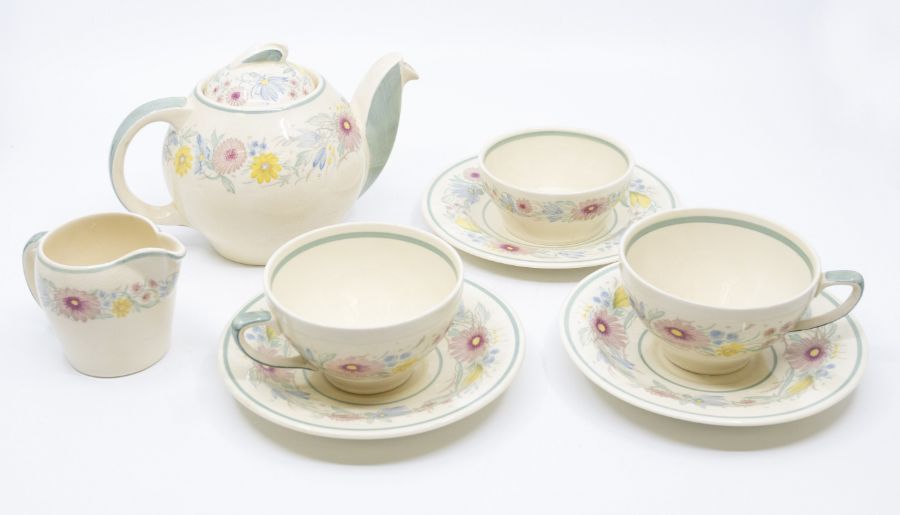 Susie Cooper: An Early Morning tea set consisting of Tea Pot, two Tea cups, small sugar bowl, milk