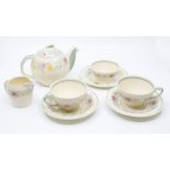 Susie Cooper: An Early Morning tea set consisting of Tea Pot, two Tea cups, small sugar bowl, milk