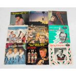 A box of Approx 70 Christmas themed Records including, 7 inch singles and EPs, to include,