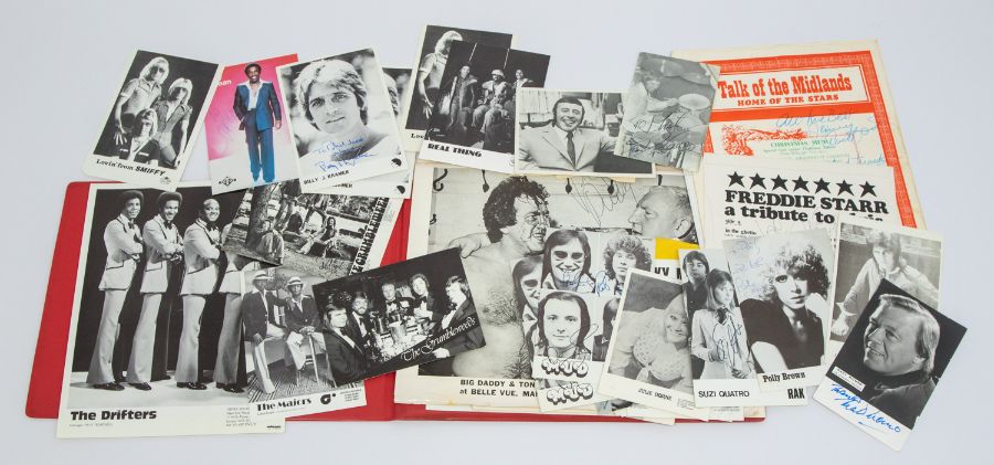 A collection of signed and not signed promotional photos/cards from client who worked at `Talk of