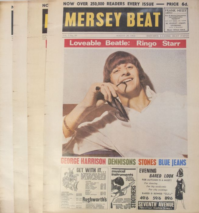 A collection of The Beatles posters. A set of 4 x Mersey Beat reproduction posters each approx 24