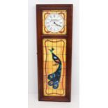 Elvis Peacock Clock - This peacock clock is based on the stained glass peacock Elvis designed for