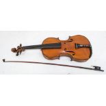 A Violin with facsimile Stradivarius label, the two-piece back of medium curl descending from the
