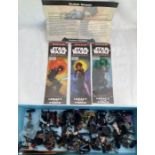 Star Wars: A collection of assorted Star Wars miniatures to include Legacy of the Force and Bounty