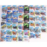 Hot Wheels: A collection of assorted Hot Wheels carded vehicles to include: HW Workshop, Drop