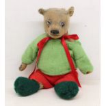 Bear: An early 20th century vintage, well-loved teddy bear, straw-filled, height approx. 18".