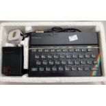 Sinclair: A Sinclair ZX Spectrum  48K personal computer complete with power supply.and connecting