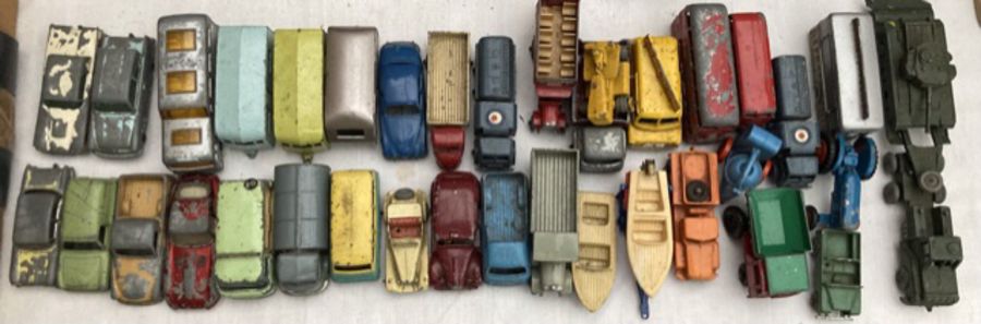 Diecast: A collection of assorted Matchbox playworn vehicles to include cars and commercials. Please