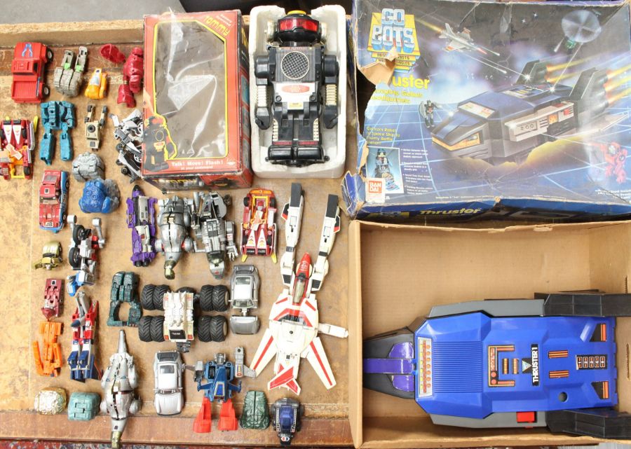 Transformers: A collection of assorted unboxed Transformers figures and vehicles; together with a