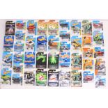 Hot Wheels: A collection of assorted Hot Wheels carded vehicles to include: Mild to Wild, The ‘90s