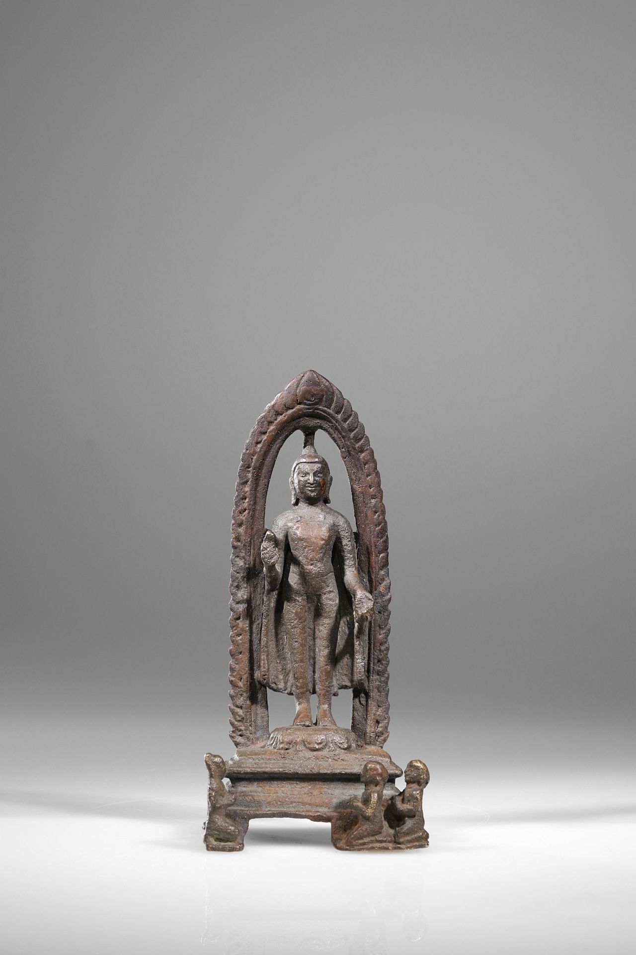 STANDING BUDDHA WITH ADORANTS