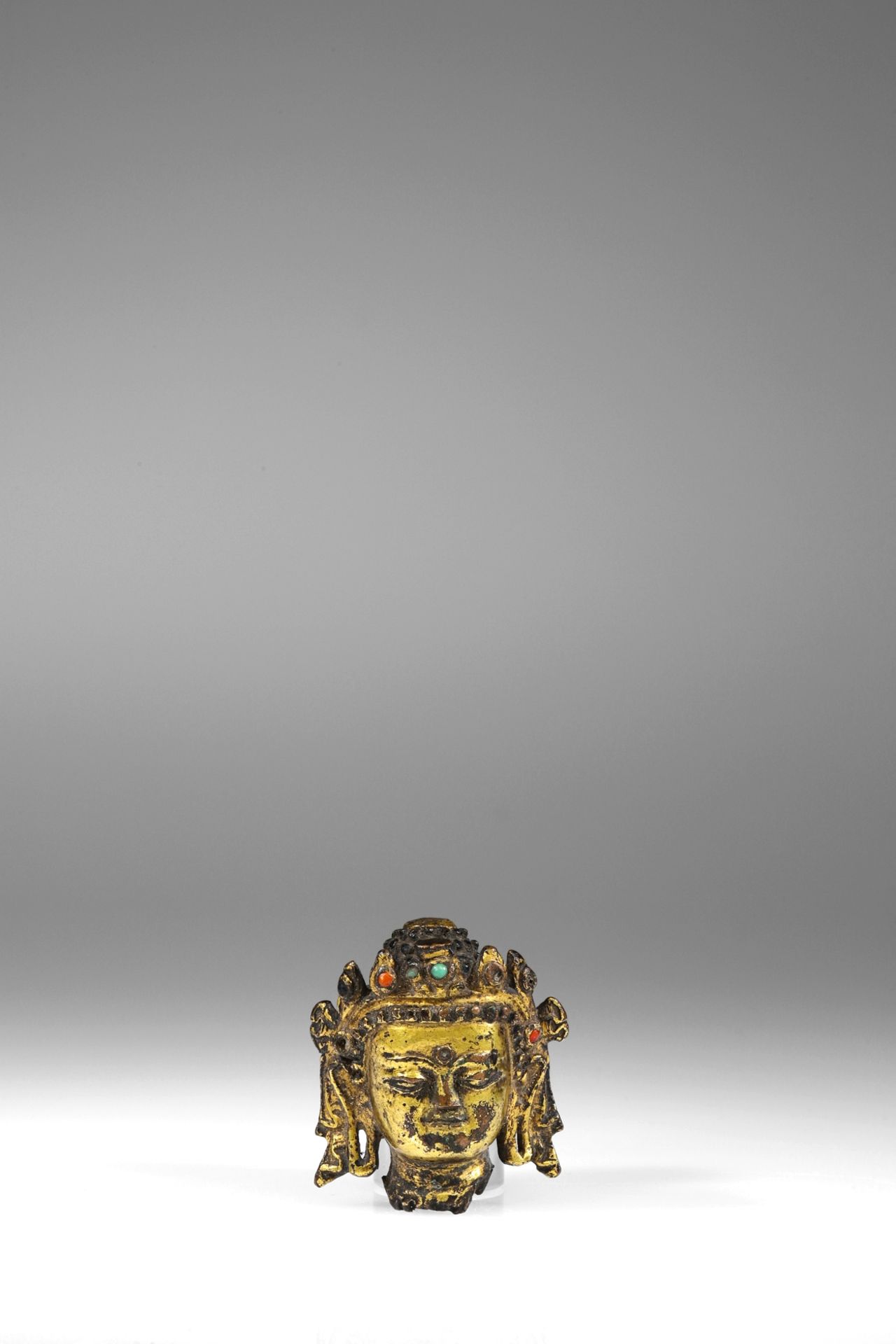 HEAD OF A CROWNED BUDDHA