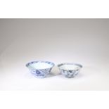 A SET OF TWO BLUE AND WHITE 'FLORAL' BOWLS,