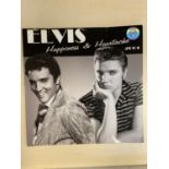 Elvis Presley books and other souvenir items. 30X30 CM