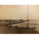 Photograph of a seaside scene. 23X30 CM