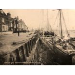 Photograph of ships in dry quay at Burnham on Crouch. On reverse a sailing ship at dock. Late 19thC.