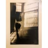 Girl against Window photograph by Trevor Watson. Signed to reverse