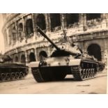 Colosseum with tank, silver gelatin photograph dated 1953 on reverse. Press agency stamp,