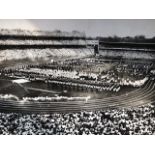 Press Photograph from Melbourne Olympics. Ron Clarke carrying the Olympic torch in 1956 Approx