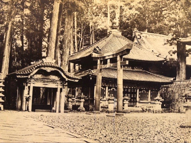 Japanese photographs mounted on card. Ancient buildings and a river with statues and a figure with