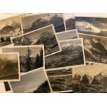 Postcards of mountains and winter scenes.