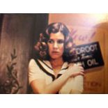 Carrie Fisher selection of photographs and lobby cards.