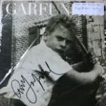 Art Garfunkel vinyl record bearing signature.