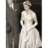 Queen Elizabeth and Prince Phillip vintage press photograph, glamorous formal dress. (S22)