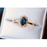 BLUE SAPPHIRE & DIAMOND RING - YELLOW GOLD BAND (HALLMARKS: '375' & 'DIA' / RING SIZE: K)