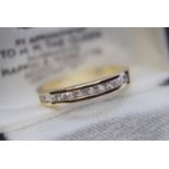 YELLOW GOLD CHANNEL SET DIAMOND RING (11 STONES) (SIZE M)