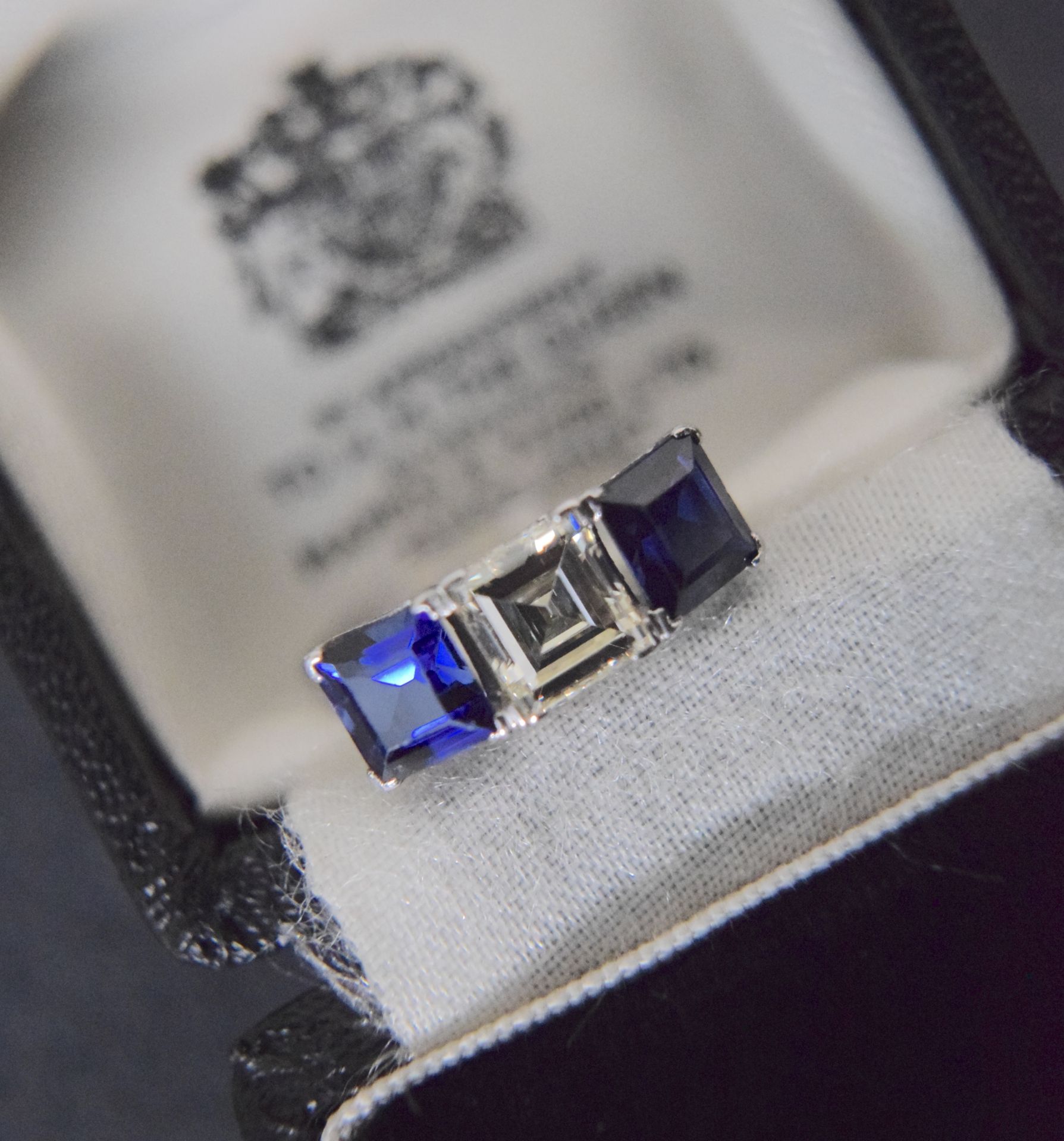 PLATINUM 1.15CT VS1 ASSCHER CUT DIAMOND RING (2.80CT APPROX. BLUE SAPPHIRE / SYNTHETIC CORONDUM)