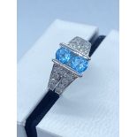 9K WHITE GOLD DOUBLE BLUE TOPAZ GEMSTONES WITH CHANNEL SET DIAMOND RING (SIZE M)
