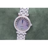 GERALD GENTA RETRO 18K WHITE GOLD JUMP HOUR WRISTWATCH WITH MOTHER-OF-PEARL DIAL AND RETROGRADE MINU