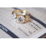 18K 3.78CT DIAMOND RING WITH CERTIFICATE (2.70CT SI2 / I / VG CENTRE DIAMOND) - 18CT YELLOW GOLD