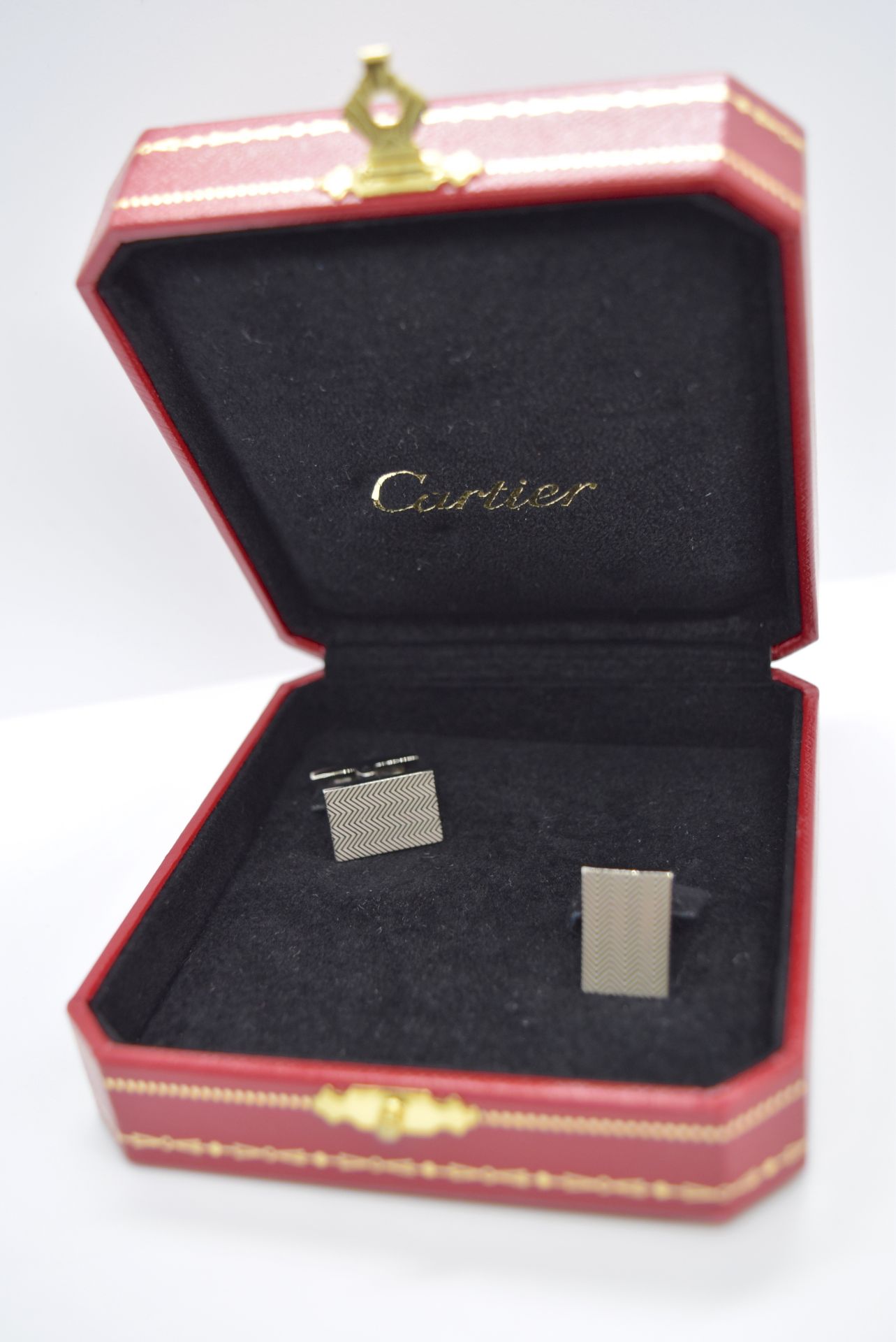 CARTIER SILVER CUFFLINKS IN RED CARTIER BOX