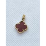 YELLOW METAL CLOVER SHAPED PENDANT - TESTED AS 18ct GOLD