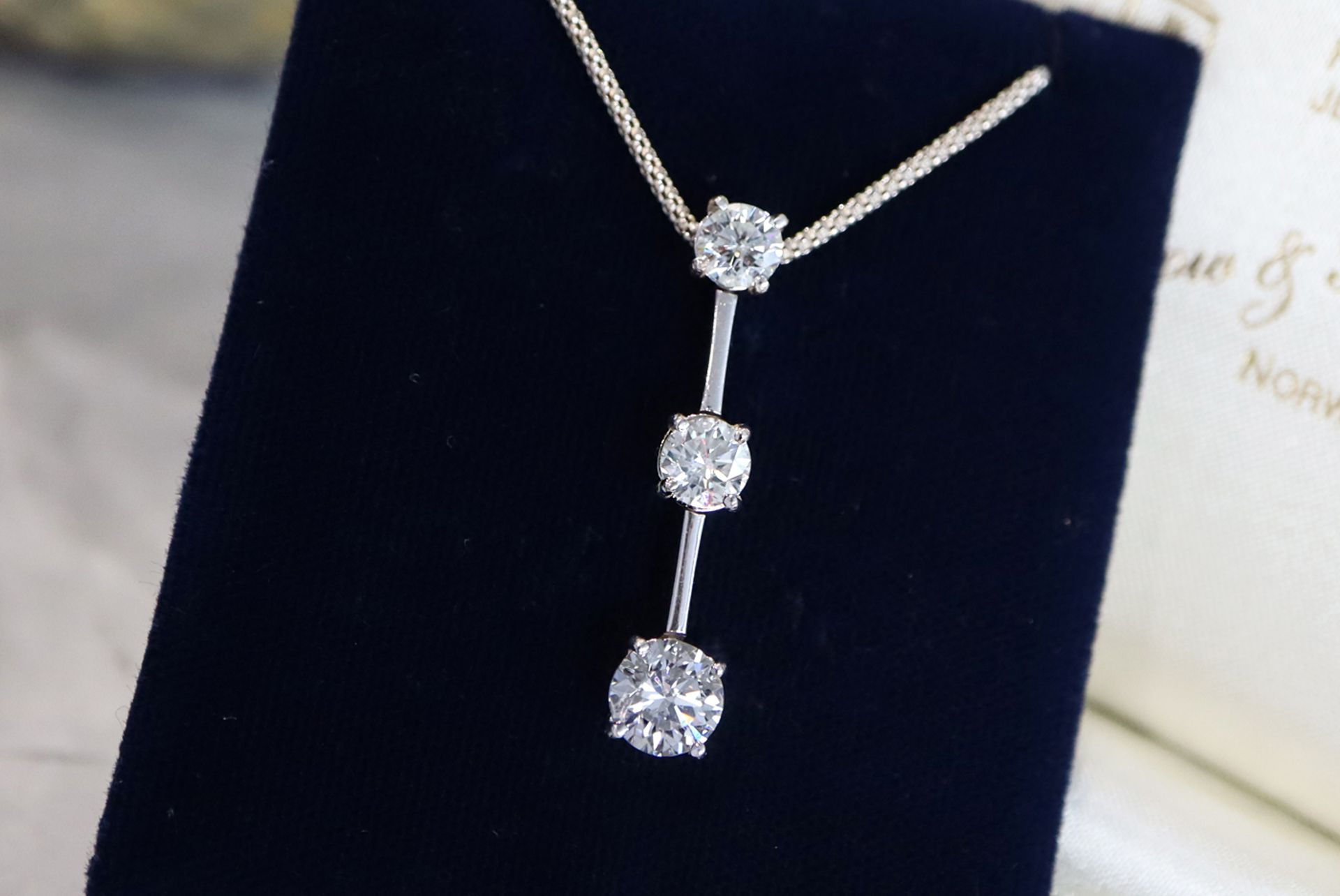 2.15CT DIAMOND TRILOGY DROP PENDANT - 18K WHITE GOLD - Image 7 of 8