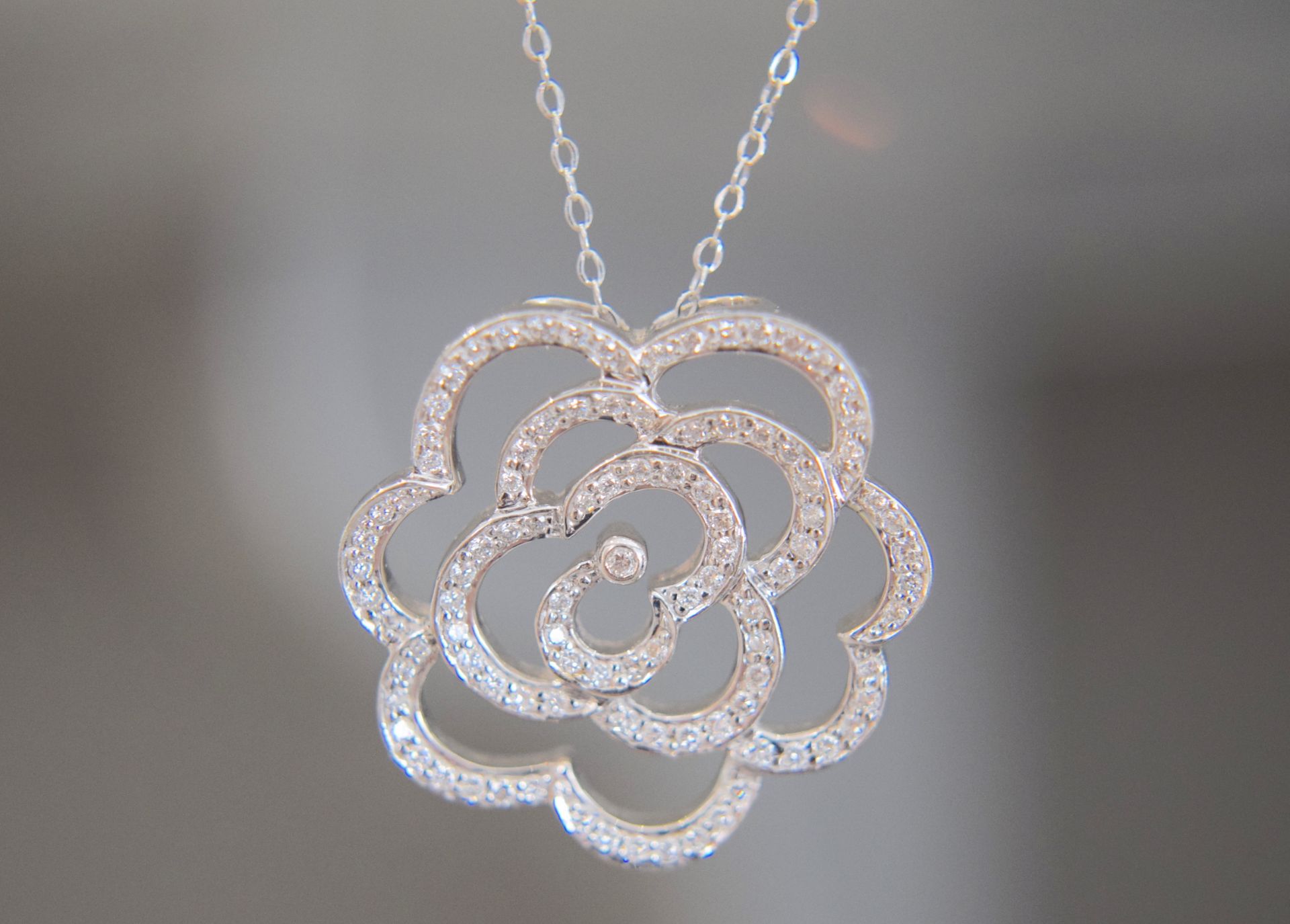 WHITE GOLD NECKLACE/ 18K DIAMOND "ROSE" PENDANT (9K CHAIN LENGTH APPROX. 18 INCHES) WEIGHT: 5.5G