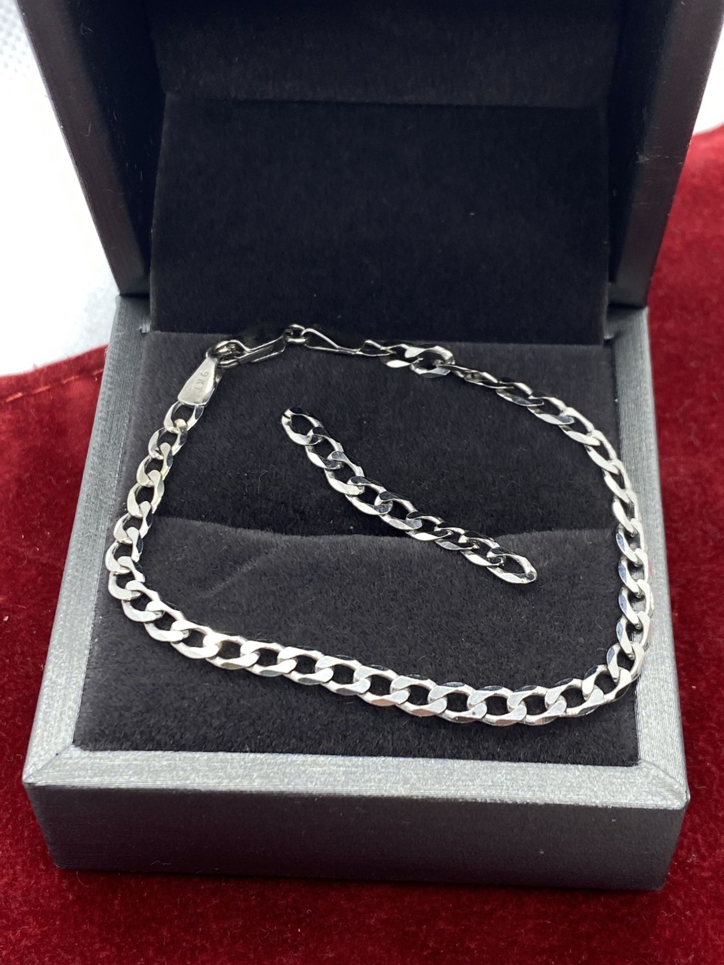 9K WHITE GOLD CURB BRACELET (15.5CM) WITH 9 SPARE CURB LINKS