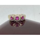 9K RUBY AND DIAMOND RING - SIZE R