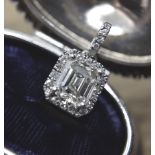 2.00CT EMERALD CUT DIAMOND PENDANT (SET IN 14K MOUNT WITH ROUND CUT DIAMONDS)