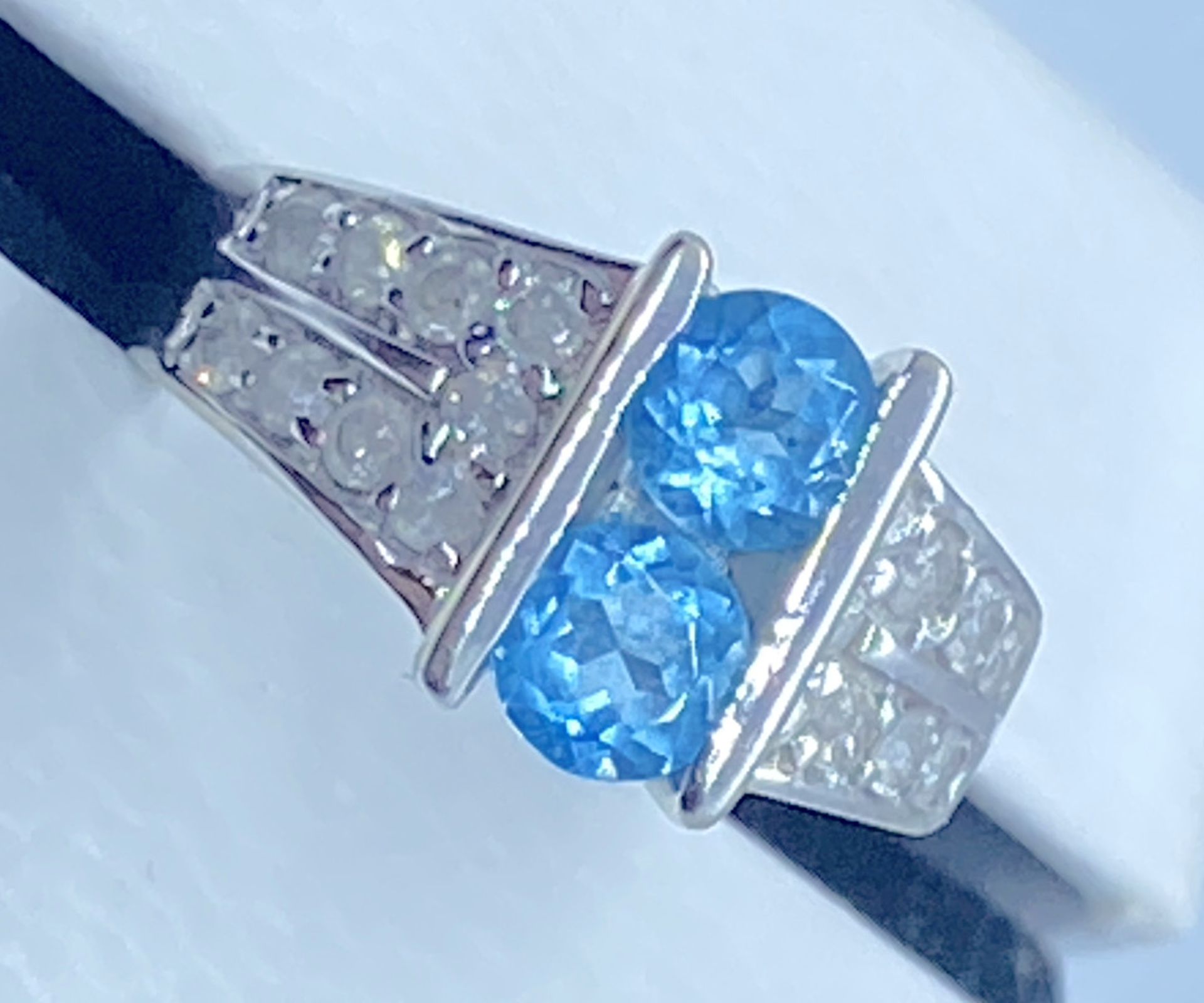 9K WHITE GOLD DOUBLE BLUE TOPAZ GEMSTONES WITH CHANNEL SET DIAMOND RING (SIZE M)