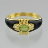 Black enamel and peridot ring In 18 Karat yellow gold, the body of the ring is covered on the