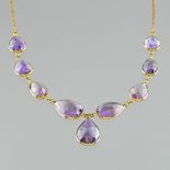 Necklace yellow gold and amethysts Yellow gold chain 9 Karat set with nine large pear cut amethysts.