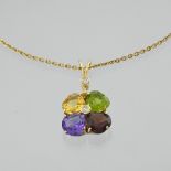 Multicoloured pendant Four-coloured flower pendant set with two brilliant-cut diamonds. Clasp and