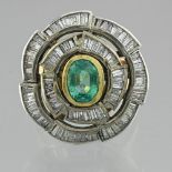 Ring skirt diamonds and emerald Silver and 9 Karat yellow gold, set with an emerald of +/- 1.80 ct