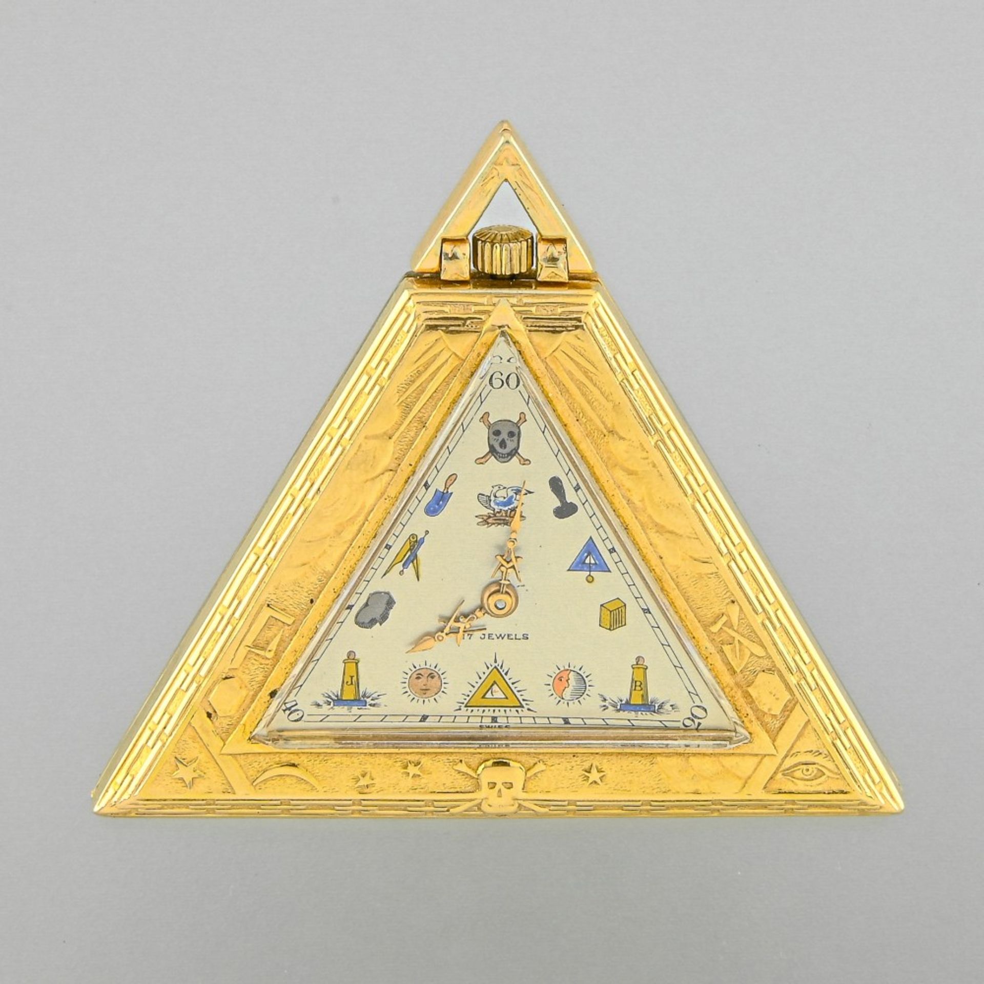 Masonic pocket watch Gold-plated triangular case, decorated with masonic symbols. Silvered champagne